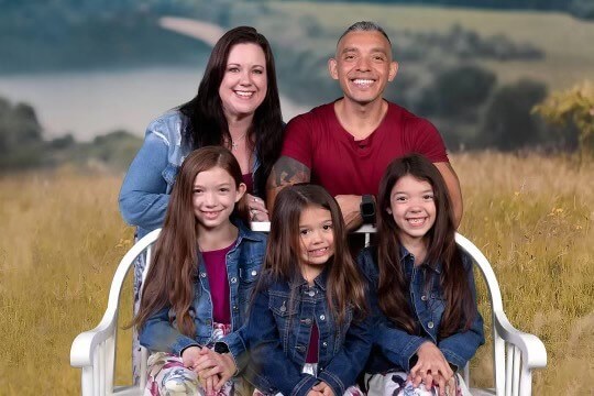 Benito family photo with his wife and three daughters